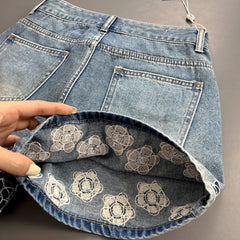 Camellia embroidered denim shorts